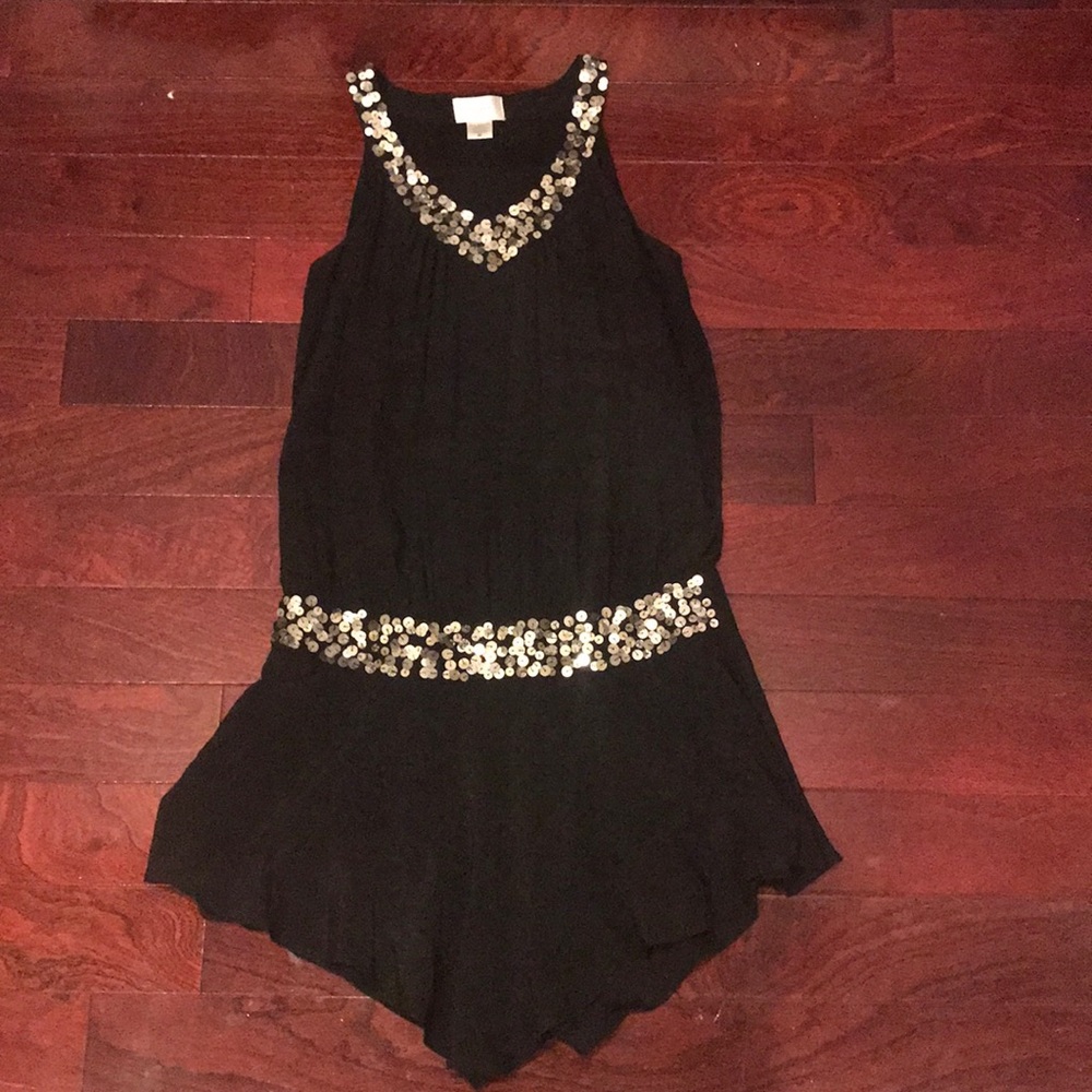 Black cocktail dress with sequin trim